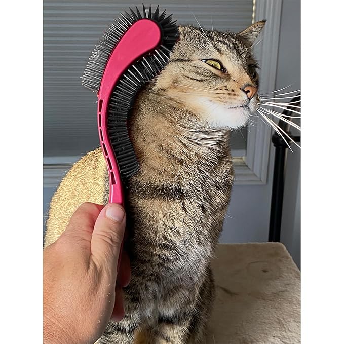 KittyWand Cat Brush, Pink. Designed for Comfort, Created for Results. This innovative grooming brush features multi contoured shapes that gently adapt to your cats body for stress free grooming.
